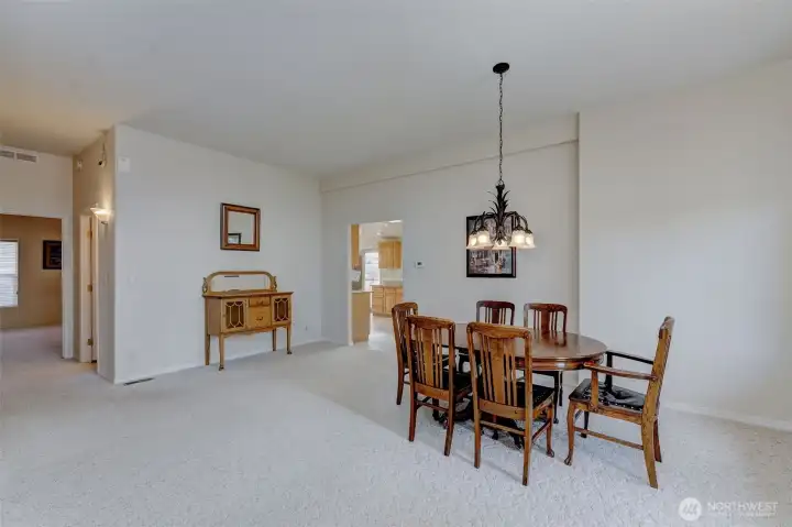 Formal dining room is spacious & ready to entertain! Dining set & sideboard are negotiable.