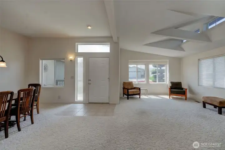 Front entry is extra gracious with its tile floor, sidelights & a window to the front porch!