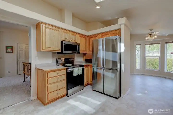 This well-appointed kitchen flows into a cheerful morning room with views that will ensure you spend your coffee time in there!