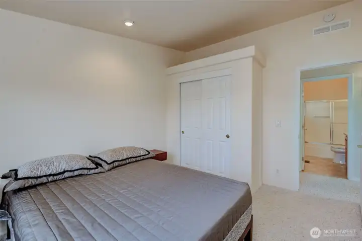 Guest bedroom provides a nice-sized closet.