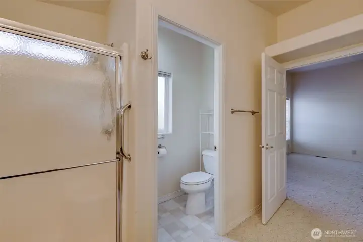 Primary ensuite also has a double-sized walk-in shower and separate water closet.