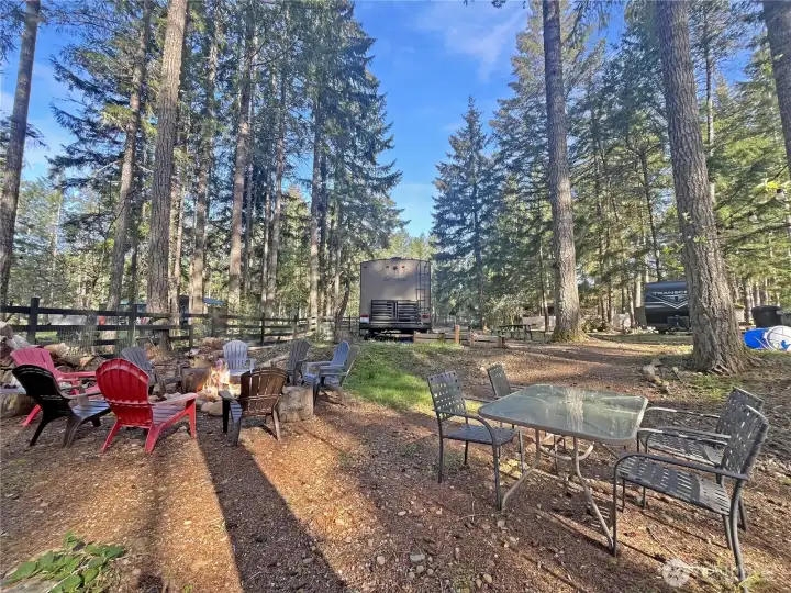 Where evenings turn into memories—this cozy firepit gathering space sets the tone for 12 & 20 N Cod Pl. With room for friends, RVs, and outdoor living, 12 Cod Pl is perfectly set up as a group camp, plus an additional adjacent lot for even more possibilities.