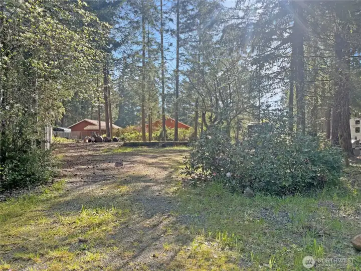 Tucked at the end of the cul-de-sac, 20 N Cod Pl offers space to create—featuring a 2-bedroom septic system, water on-site, partial fencing, and a foundation already started.