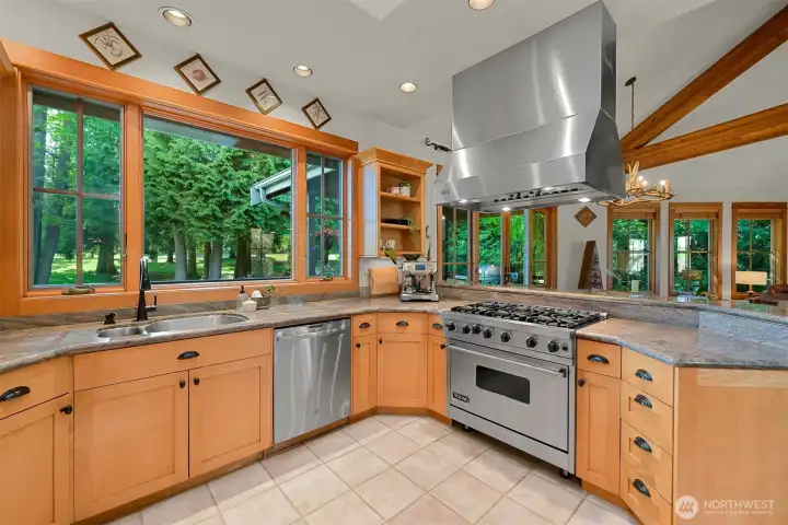 Gourmet kitchen equipped with high-end appliances, including Sub-Zero and Viking.
