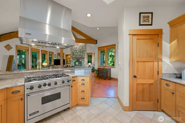 Ample counter space and bar seating make the kitchen perfect for cooking and entertaining.