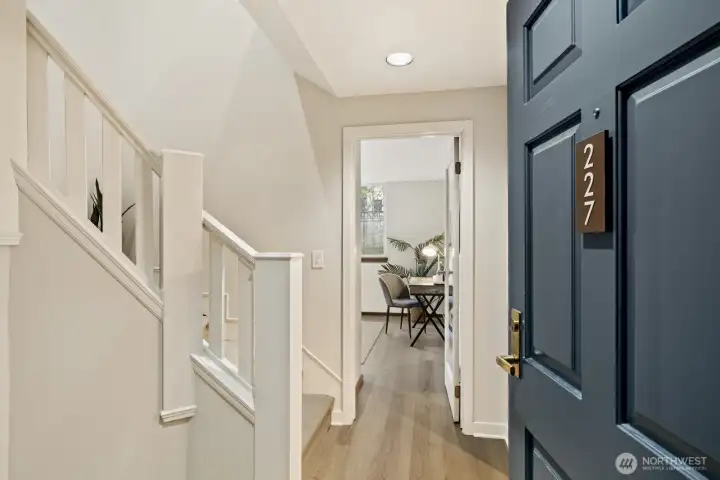 Step inside to find a light-filled two-story unit with so much to love!