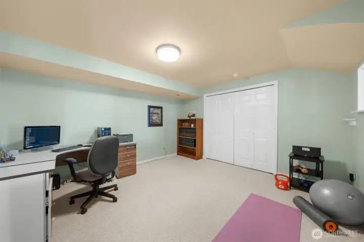 Versatile bonus room ideal for a home office, fitness area, hobby room, or additional guest space.
