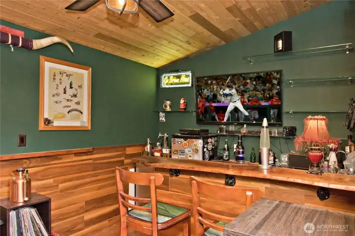 Walnut wainscoting, Harwood flooring, Granite counters and Walnut slab bar top!