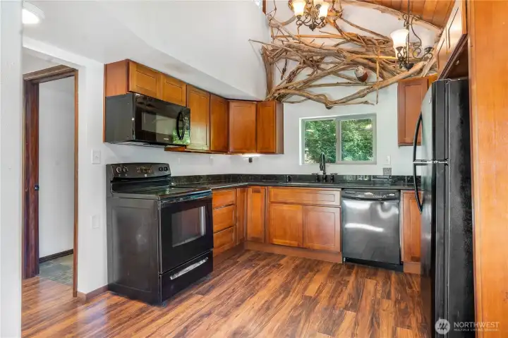Kitchen with granite counters. Kitchen with granite counters.