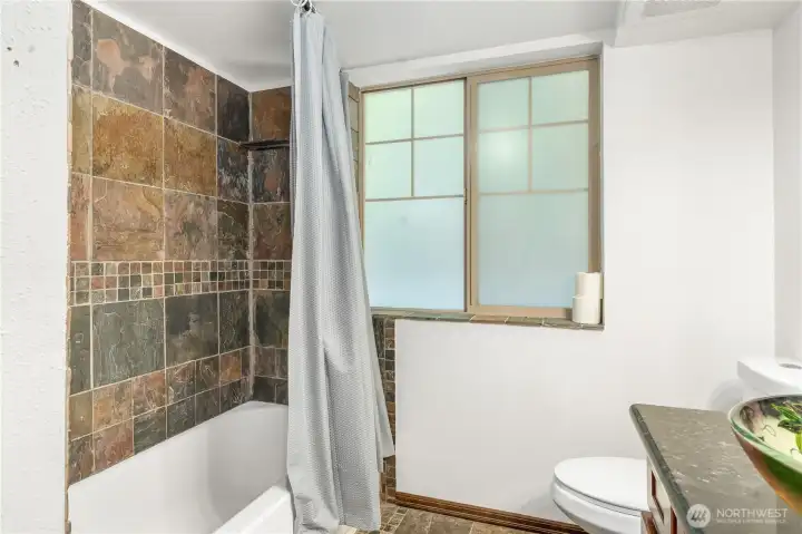 Bathroom has tub & shower. Bathroom has tub & shower.