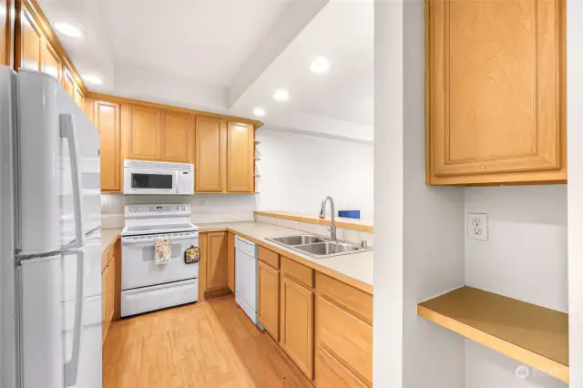 Plenty of cabinets in the kitchen.