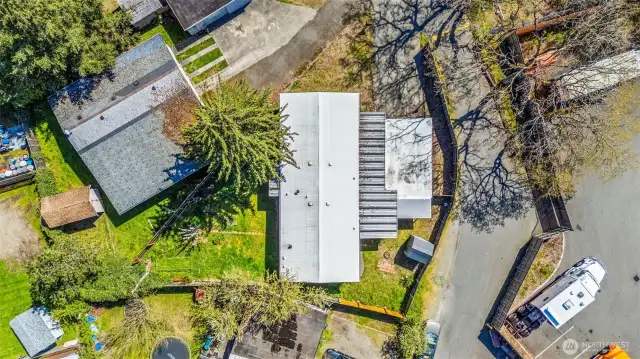 Another aerial perspective to see the lot in full to better understand the size versus many of the neighboring lots.