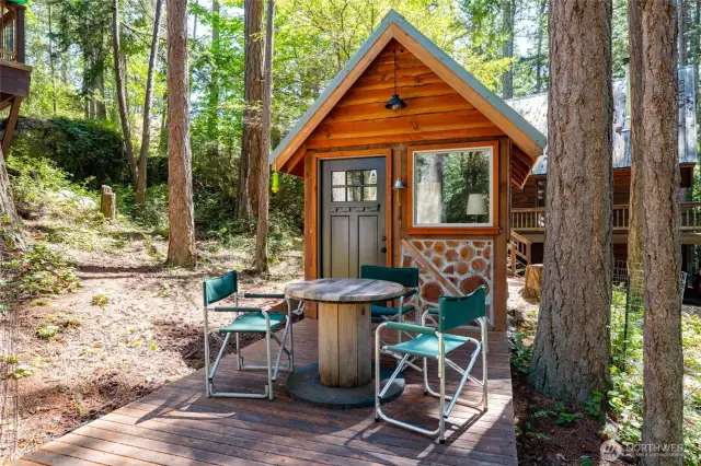 Fun cordwood cottage for office, art studio or bunk house.