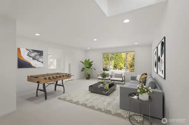 Enormous bonus room upstairs accessed by the rear staircase off the family room and front bedroom stairway. (Virtually staged)