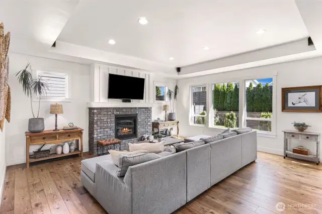 Enjoy the gas fireplace and shiplap accents throughout