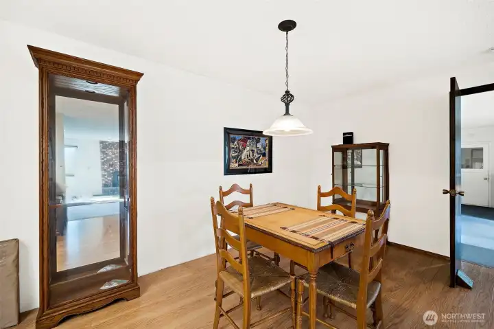 Through the dining room you'll find an additional Great room with possibility for wet bar (door pictured at right)