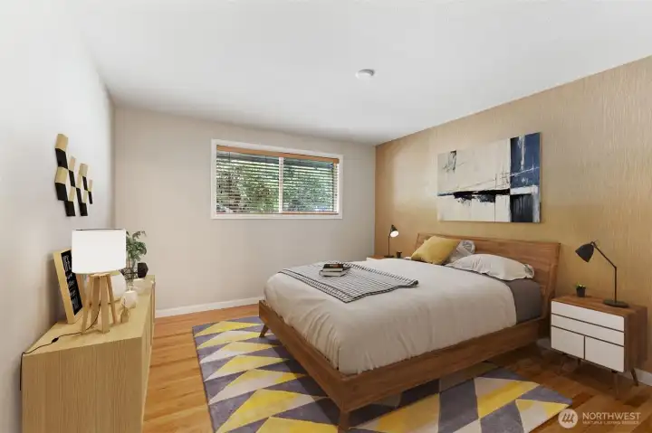 Primary Bedroom - Grass-cloth on accent wall. Hardwoods throughout.