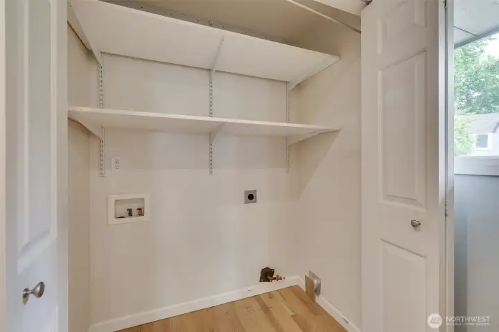 Washer and dryer just off the kitchen for convenience.