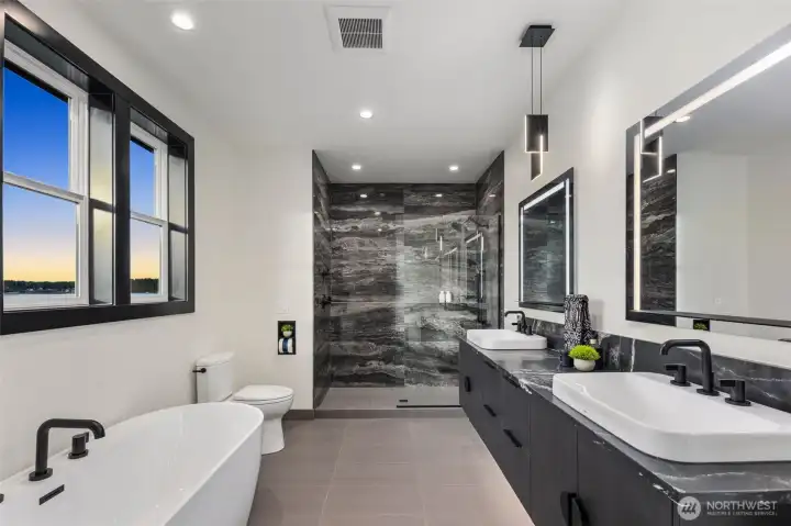 Spa-inspired upstairs bath w/dual vanity & designer finishes.