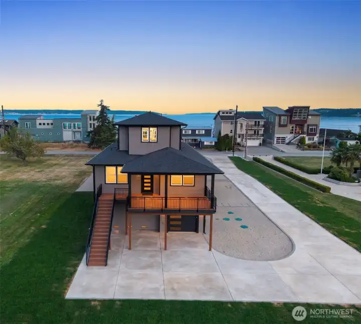 Paved driveway, private, multiple outdoor areas.