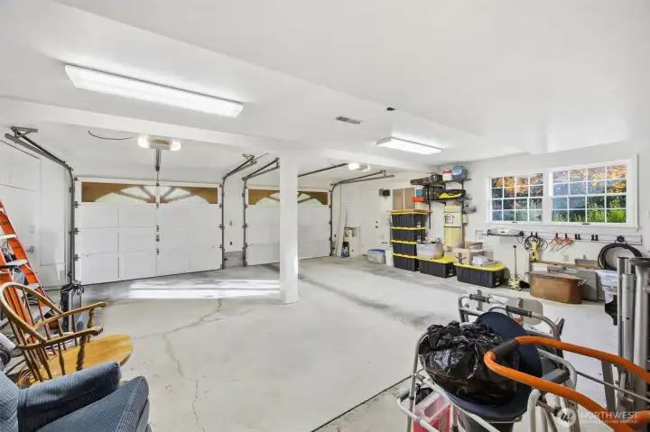 Large garage with built-in cabinets