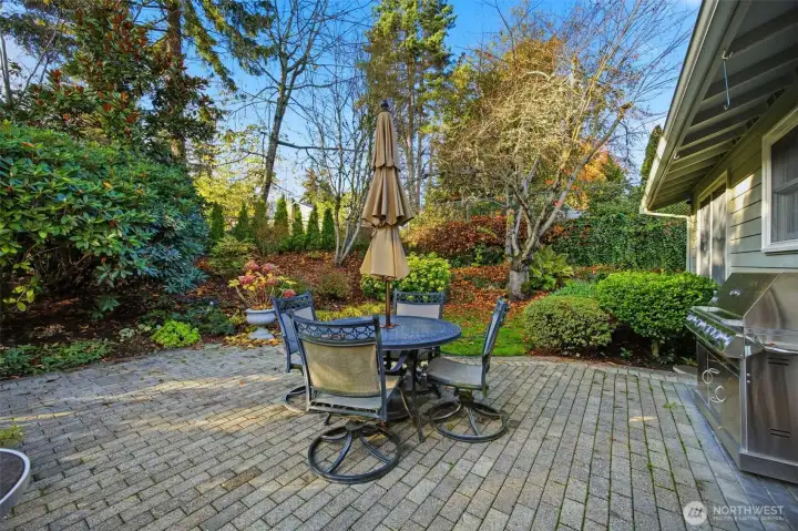 Paved backyard patio upper level