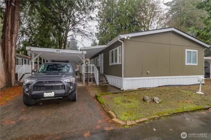 Carport with entry to living room.