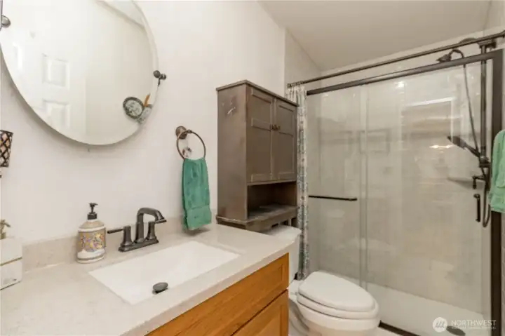 Main bathroom with updated walk in shower