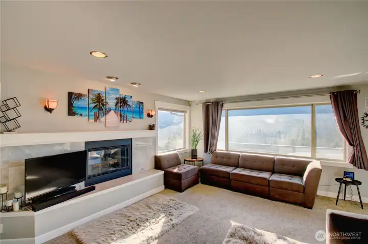 Living room with gas fireplace.