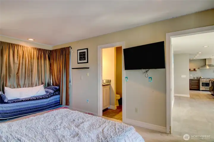 Main floor ensuite has full bath.