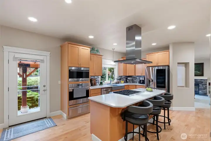 Door to backyard with covered space for winter BBQing