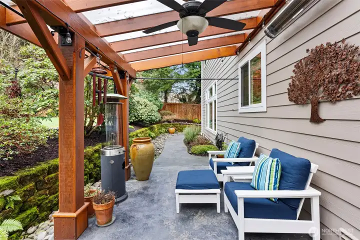 Covered patio space off the kitchen.  Perfect for enjoying the backyard year round.
