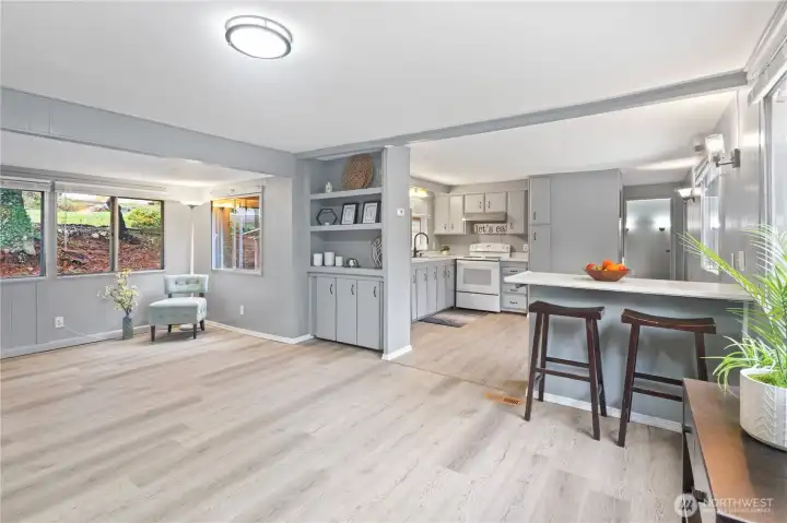 Open living space that flows nicely into the kitchen and dining area.