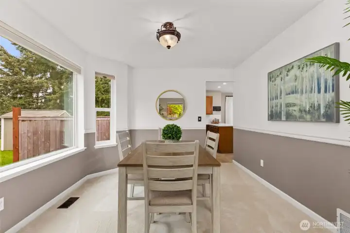 Large dining room off of the kitchen (new carpet in 2026)