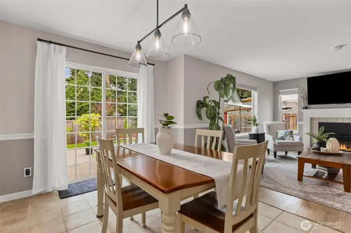 Eating area off kitchen blends into the inviting family room