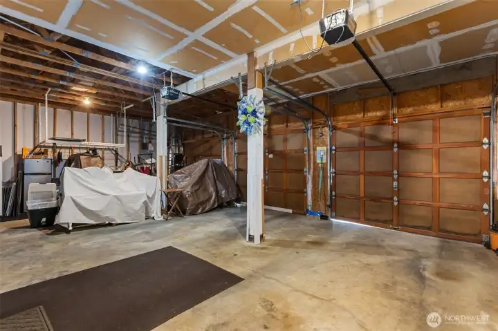 Well-kept three car garage with racked storage