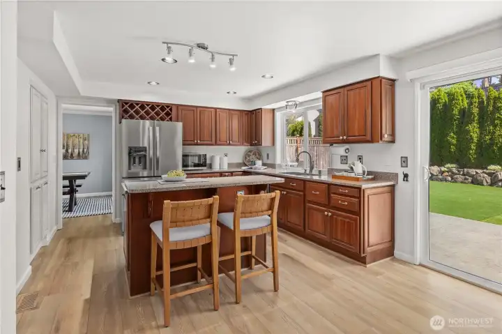 Kitchen with Sliding Door to Backyard Entertaining