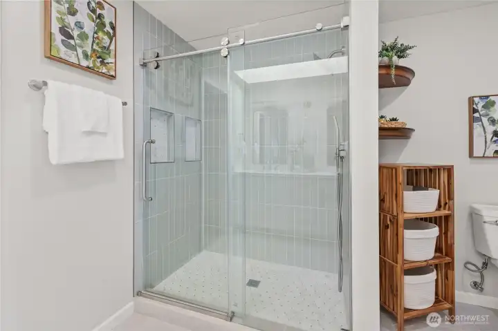 Newly Remodeled Primary Bathroom Shower with Custom Finishes