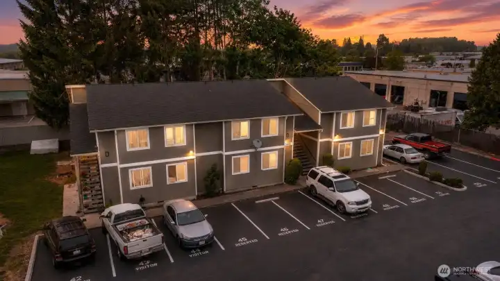 12 uncovered parking spaces