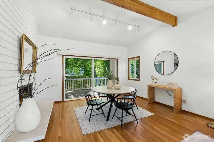 Bright dining space with seamless flow to the living room and backyard. Bright dining space with seamless flow to the living room and backyard.
