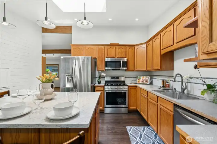 Well-appointed kitchen featuring stainless appliances and extensive storage. Well-appointed kitchen featuring stainless appliances and extensive storage.