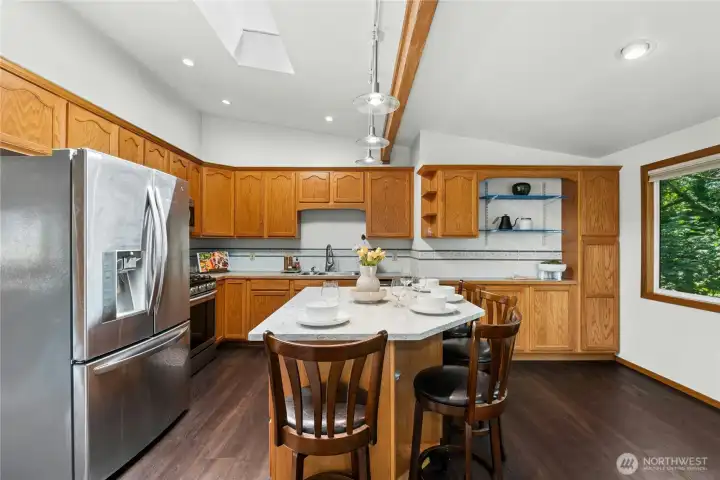 Large kitchen designed for gathering, cooking, and entertaining. Large kitchen designed for gathering, cooking, and entertaining.