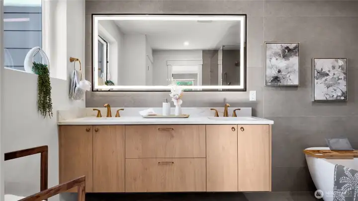 The primary suite bathroom is elegant and peaceful The primary suite bathroom is elegant and peaceful