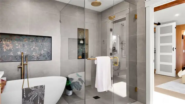 The primary suite bathroom has heated floors - even in the shower! The primary suite bathroom has heated floors - even in the shower!