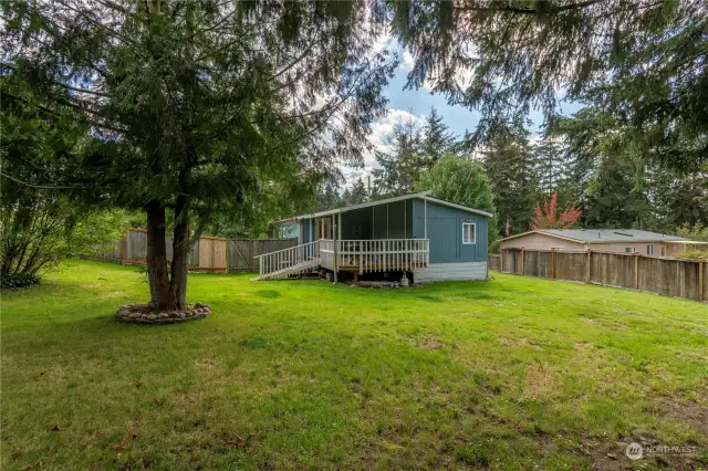 Distance view of the home and yard.