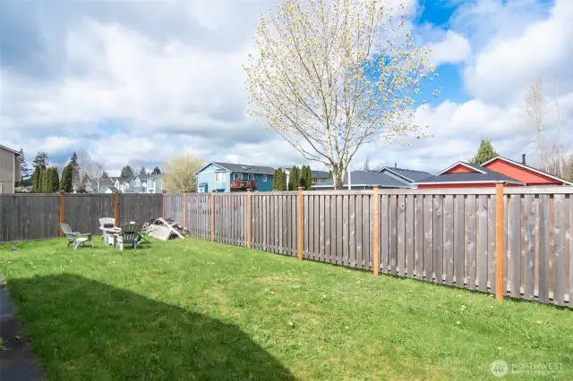Huge back yard partially fenced. Private setting.