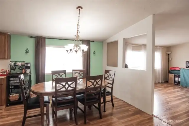 Spacious dining room is open to the family room.  There is room to expand the table