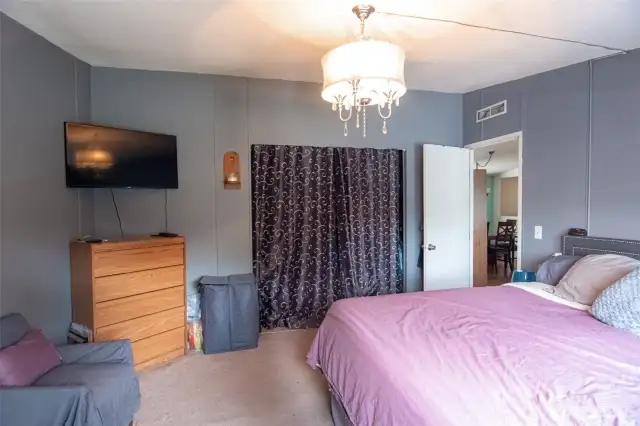 Primary bedroom is separate from the spare bedrooms.