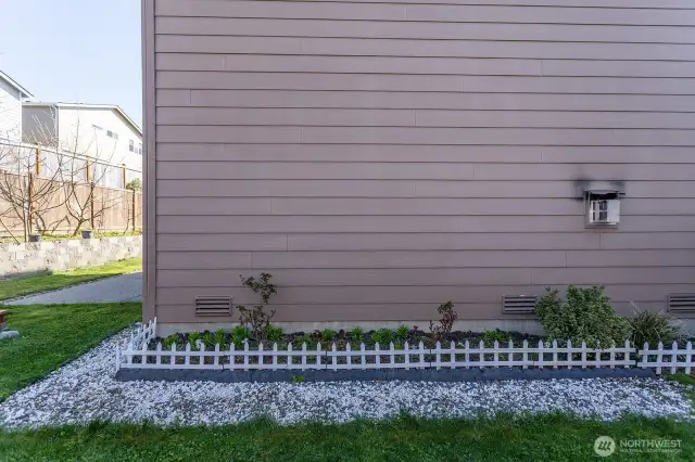 Long Flower-bed on the side of the house