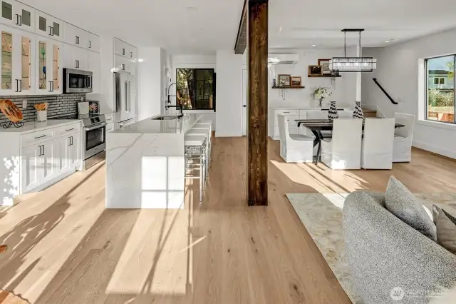 Open floorplan, exposed beam, engineered hardwood floor & so much more!